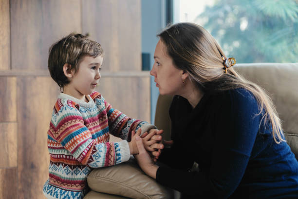 Mother Consoles Her Little Sad Son