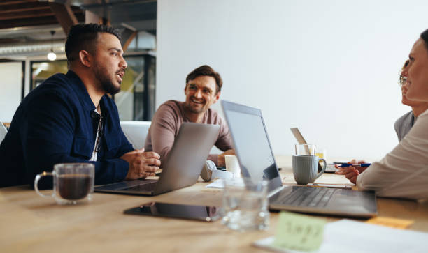 istock Marketing professionals having a discussion in a meeting 1464121427