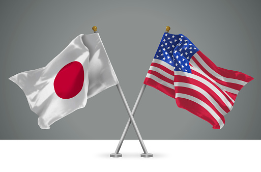 3D illustration of Two Wavy Crossed Flags of United States of America and Japan, Sign of American and Japanese Relationships