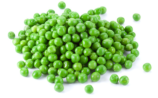 Heap of raw green peas isolated on white background.