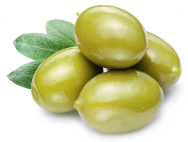 istock Green olives with leaves on white background. Close-up. 1464123967