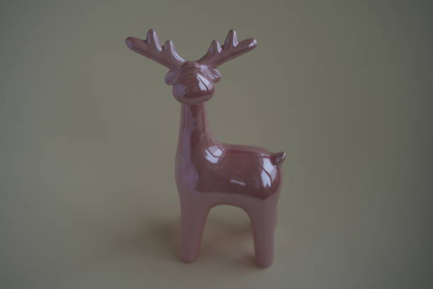 istock Toy deer figurine isolated over the white background 1464125450