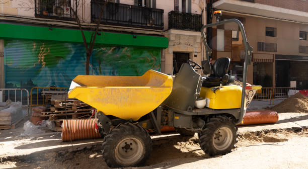 escavadeira estacionada na rua sem operar - wheel tractor scraper - fotografias e filmes do acervo