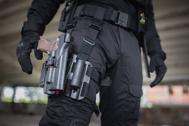 istock Close-up of a young man standing in special force gear 1464128352
