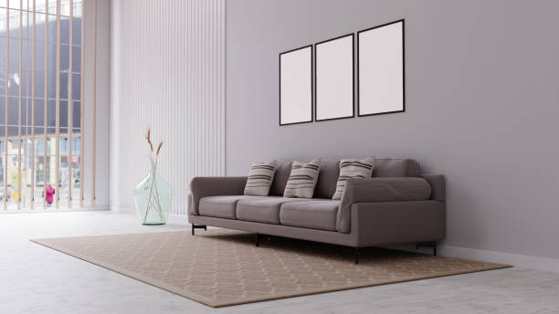 istock Living room interior in beige colors with three big whit frames. 3d render 1464131180