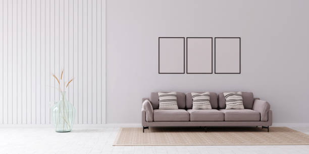 istock Living room interior in beige colors with three big whit frames. 3d render 1464131192