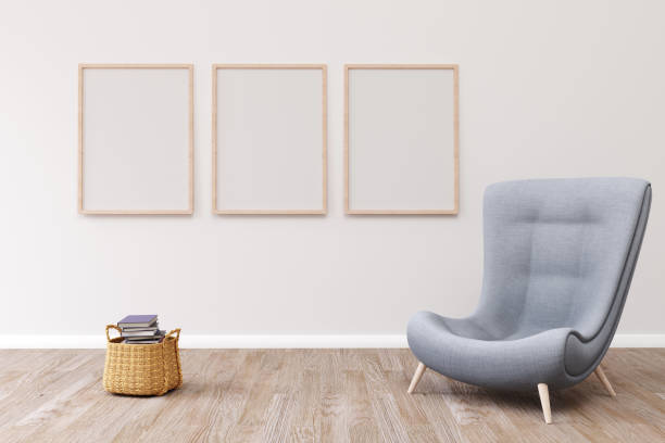 istock Modern room design with a blue armchair and three frames on the wall. 3d render 1464131244