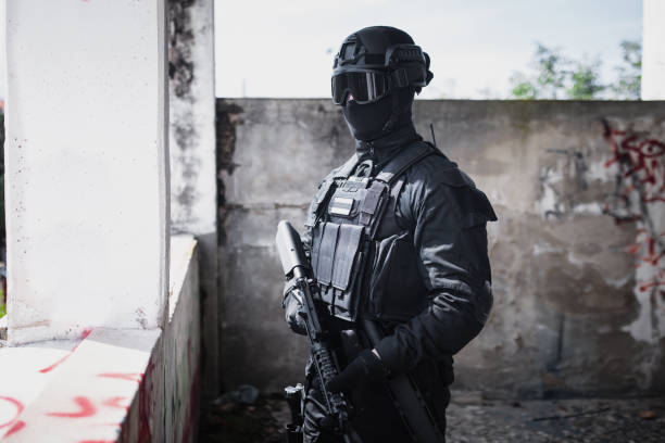 istock Young man standing in special force gear 1464134291