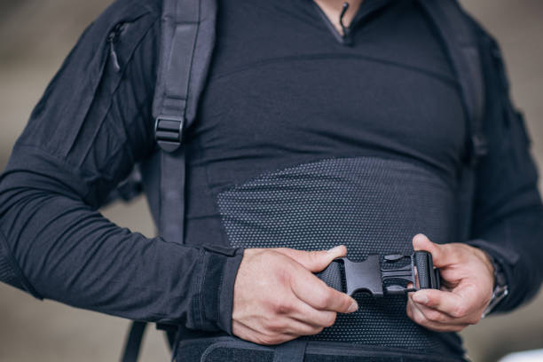 istock Close-up young man putting military tactical equipment 1464136823