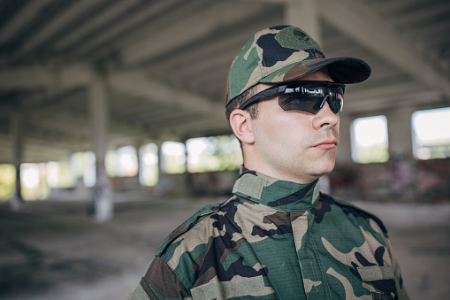 Portrait of a military man in warehouse