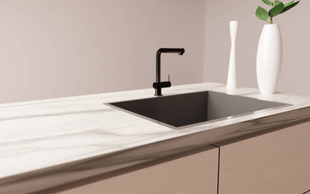 istock White marble kitchen counter, with black faucet 1464138107