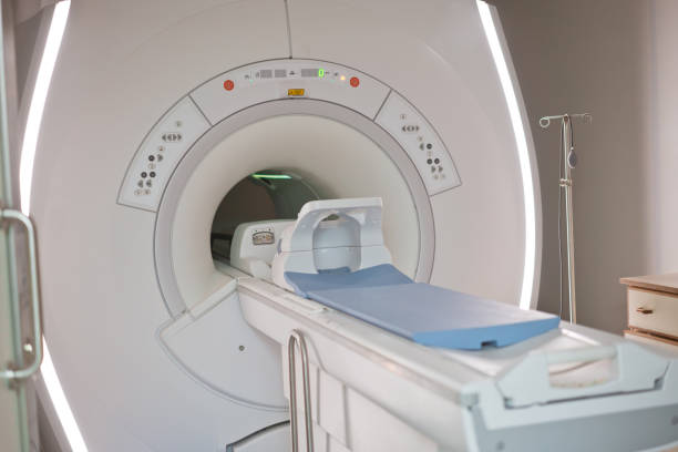 istock MRI scanner machine in medical examination room 1464147671