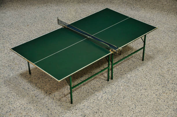 istock Ping-pong table with green and black net 1464150219