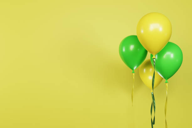 istock 3D rendering yellow green balloons on blank space yellow background 1464152494