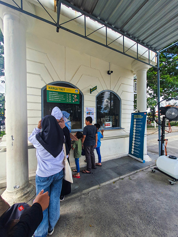 Yogyakarta, Indonesia in November 2022. Tourists are lining up to buy entrance tickets to the Fort Vredeburg Museum. In the past, it was a fort building that functioned as one of the Dutch defense tools. There, the Dutch monitored the situation around the Yogyakarta Palace.