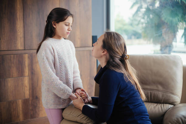 istock Mother Consoles Her Little Sad Daughter 1464157064