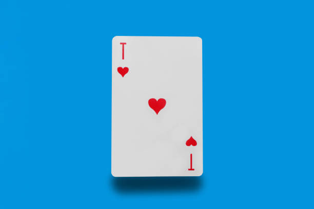 istock Playing cards ace of hearts on a blue background 1464157066