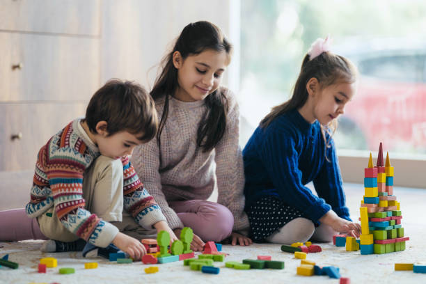 istock Children Playing With Toy Blocks At Home 1464158977