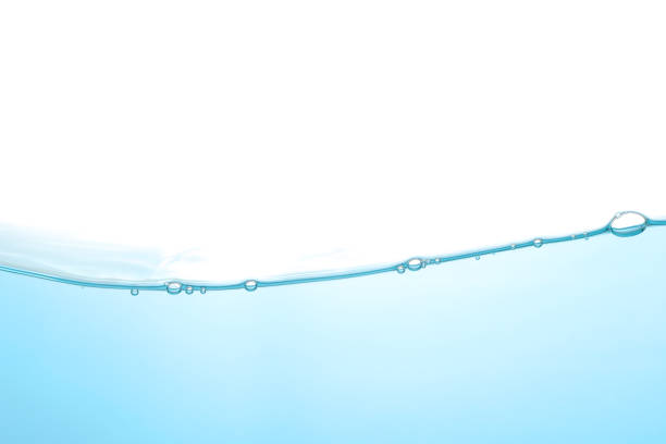 istock The surface of the water. White background. Movement. Close-up view. 1464158983