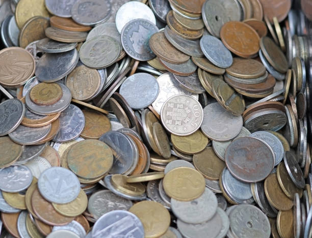 istock Antique, vintage coins from different countries 1464161253