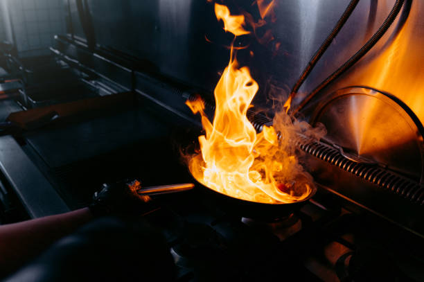 istock Fire in the kitchen. fire in the pan. 1464163091