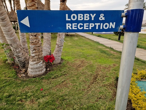 Reception sign at a tourist resort close-up photography.