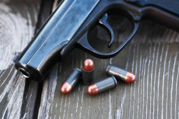 istock Bullets Near Handgun 1464164339