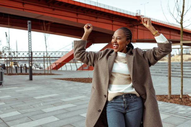 istock Black woman in town 1464165425