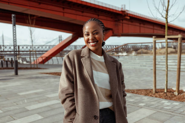 istock Black woman in town 1464165433