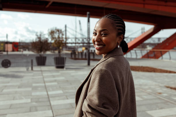 istock Black woman in town 1464165473