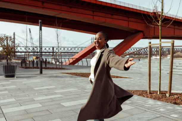 istock Black woman in town 1464165474
