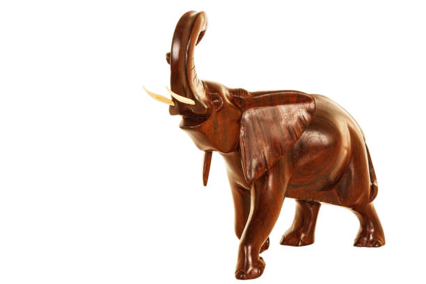 Carved wooden Elephant statue isolated on a white background