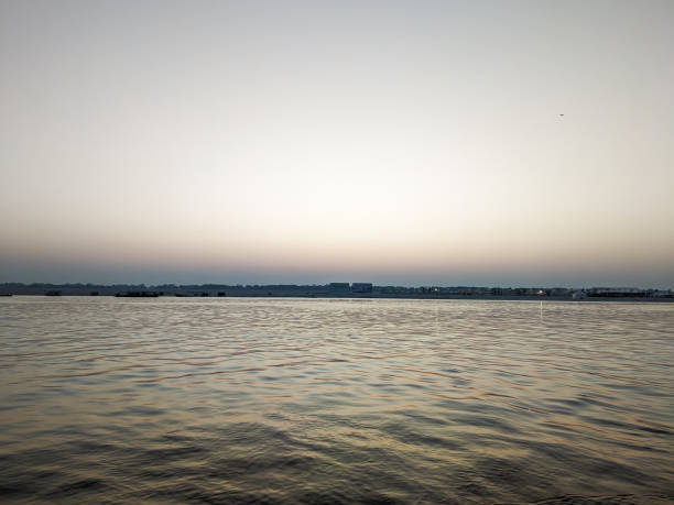 варанаси - morning river ganges river varanasi стоковые фото и изображения