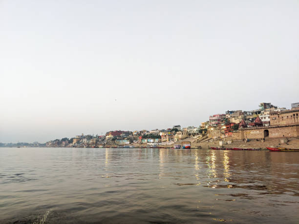 варанаси - morning river ganges river varanasi стоковые фото и изображения