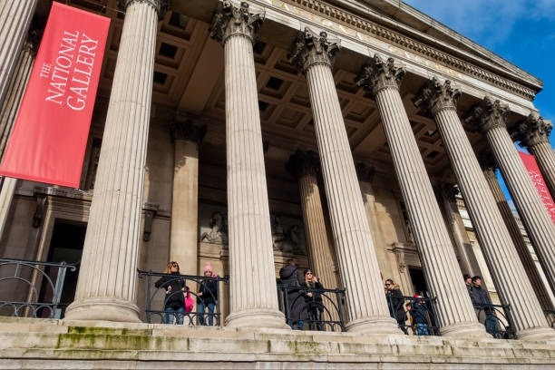 London, UK - October 22 2025: exterior view of the British Museum with people walking outside.