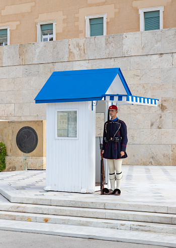 Athens, Greece - November 11, 2022: A picture of one of the guards at the Monument to the Unknown Soldier, at the Hellenic Parliament.