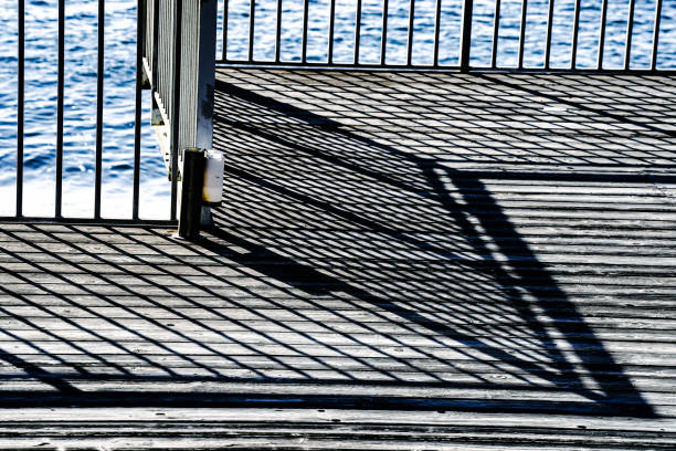 fence with bars in front of the sea