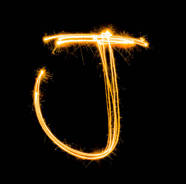 istock light painting J on black background,Blur 1464176447