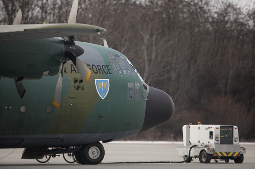 Otopeni, Romania - February 6, 2023: Lockheed C-130 Hercules military cargo plane of the Romanian Air Force.