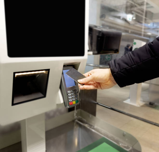 istock Customer pays his purchase at the supermarket,self checkout systems in  retail stores,Barcode scanner,Self checkout machine 1464187400