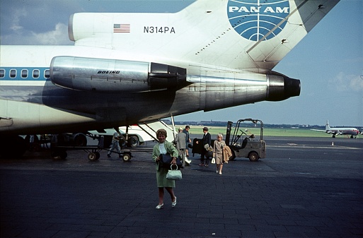 Berlin (West), Germany, 1968. Passengers disembark from a PanAm airline plane at the former Tempelhof Airport.