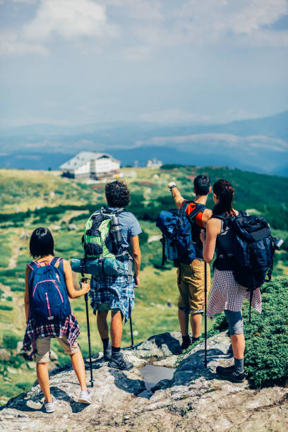 istock Group of friends hiking 1464198313
