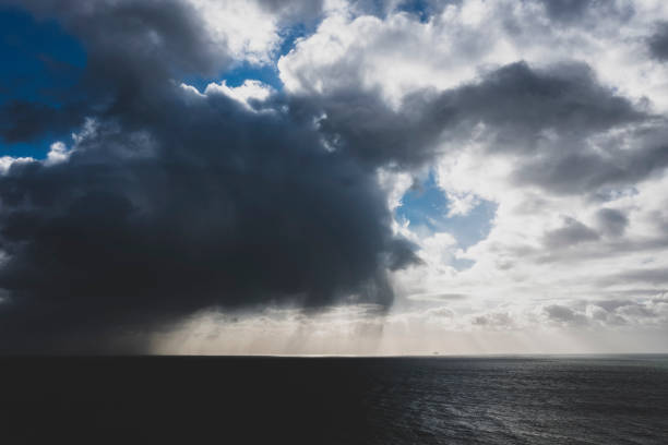 istock Storm clouds over the ocean, storm over the ocean. 1464199673