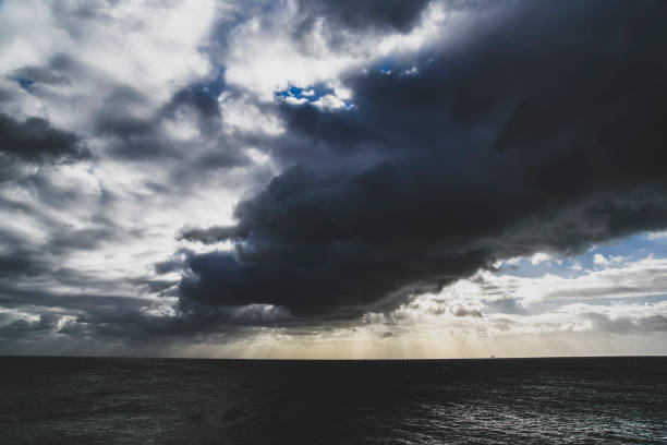 istock Storm clouds over the ocean, storm over the ocean. 1464199761