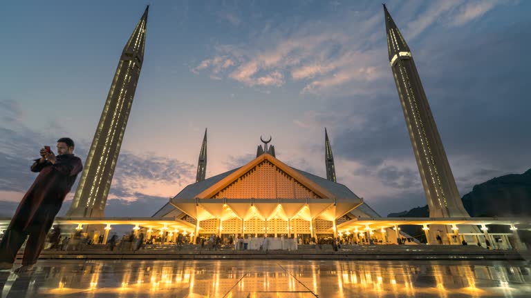 Timelapse Sunset Scene Moving Cloud and People at Faisal Mosque famous travel location in Islamabad Pakistan