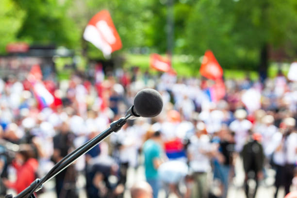 istock Protest, public demonstration, employment and labor, human rights or pension reform strike 1464204519