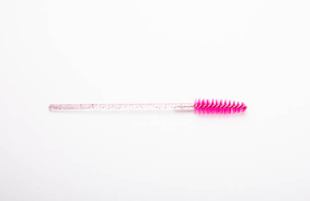 istock Mascara brushes, makeup brushes, applicators isolated on white background. Close-up. Brushes for eyelash extensions. 1464208656