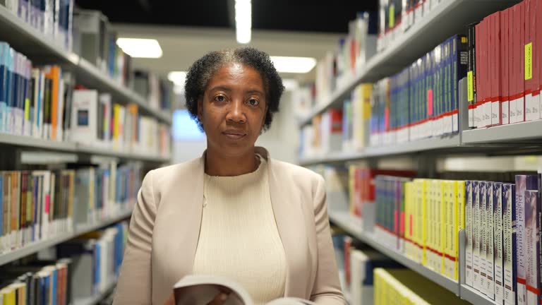 Portait of a mature woman in the library