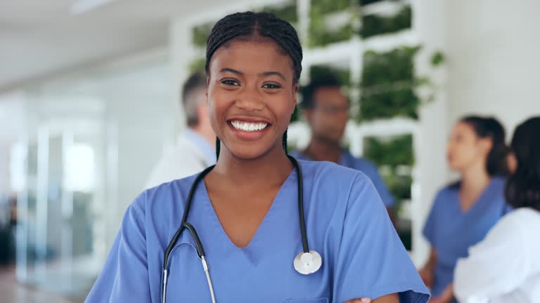 Black woman, doctor and face with smile, healthcare and hospital staff, medical professional and health insurance. Medicine, clinic and health worker in portrait, happy with success and cardiology.