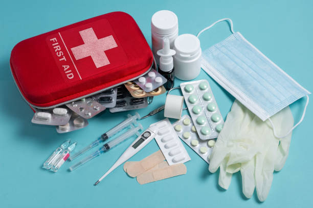 istock Home first aid kit on a blue background. The elements of the first aid kit 1464217124